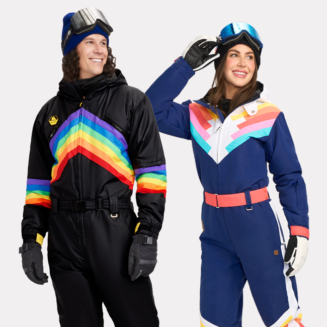 shop snow suits - models wearing men's midnight shredder snow suit and women's santa fe shredder snow suit