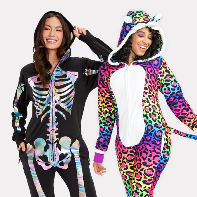 shop onesies - models wearing women's iridescent skeleton costume and women's 90s leopard costume