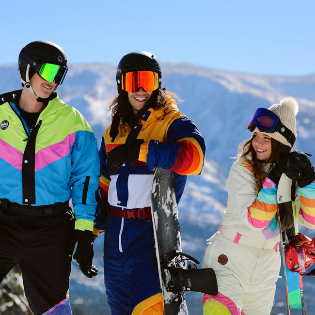 shop snow suits - men's icy blunder snow suit, men's vintage freestyle snow suit, and women's retro rainbow snow suit