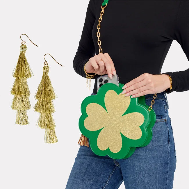 shop accessories - gold tassel earrings and clover purse