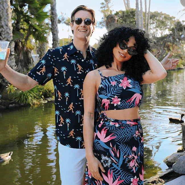 Shop Vacation - image of man wearing hawaiian shirt and woman wearing 2-piece maxi dress