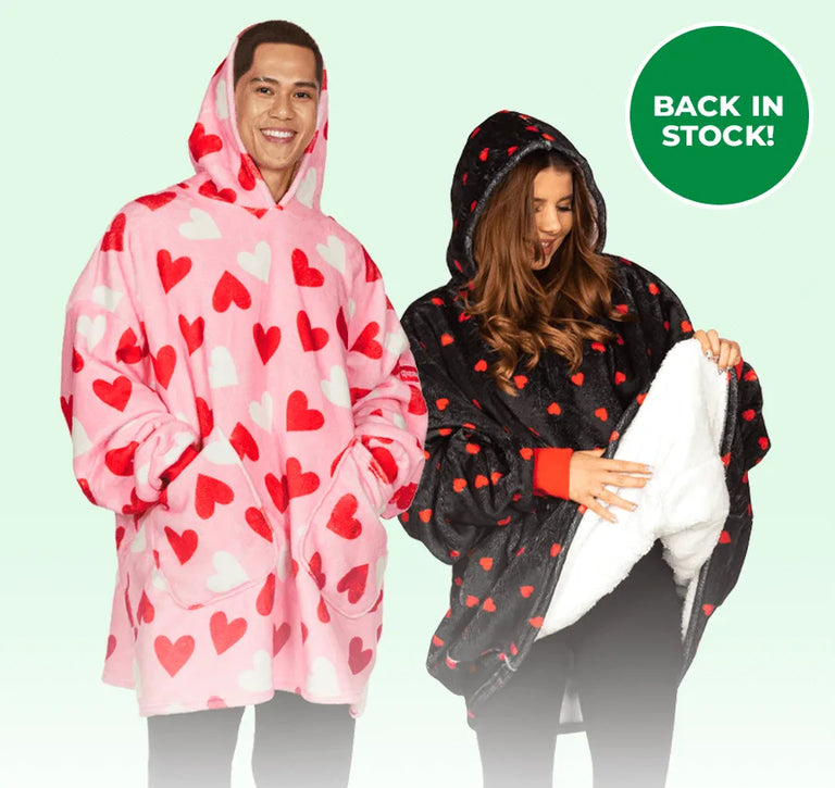 shop valentine's day gifts - image of man and woman wearing blanket hoodies